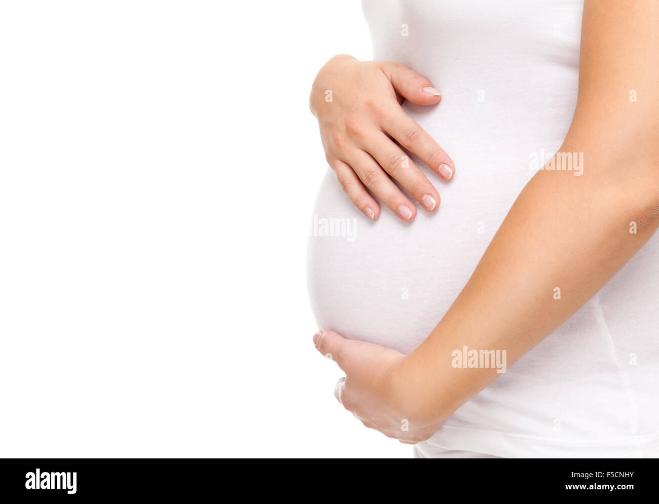 Portrait of a pregnant woman holding her belly Stock Photo - Alamy