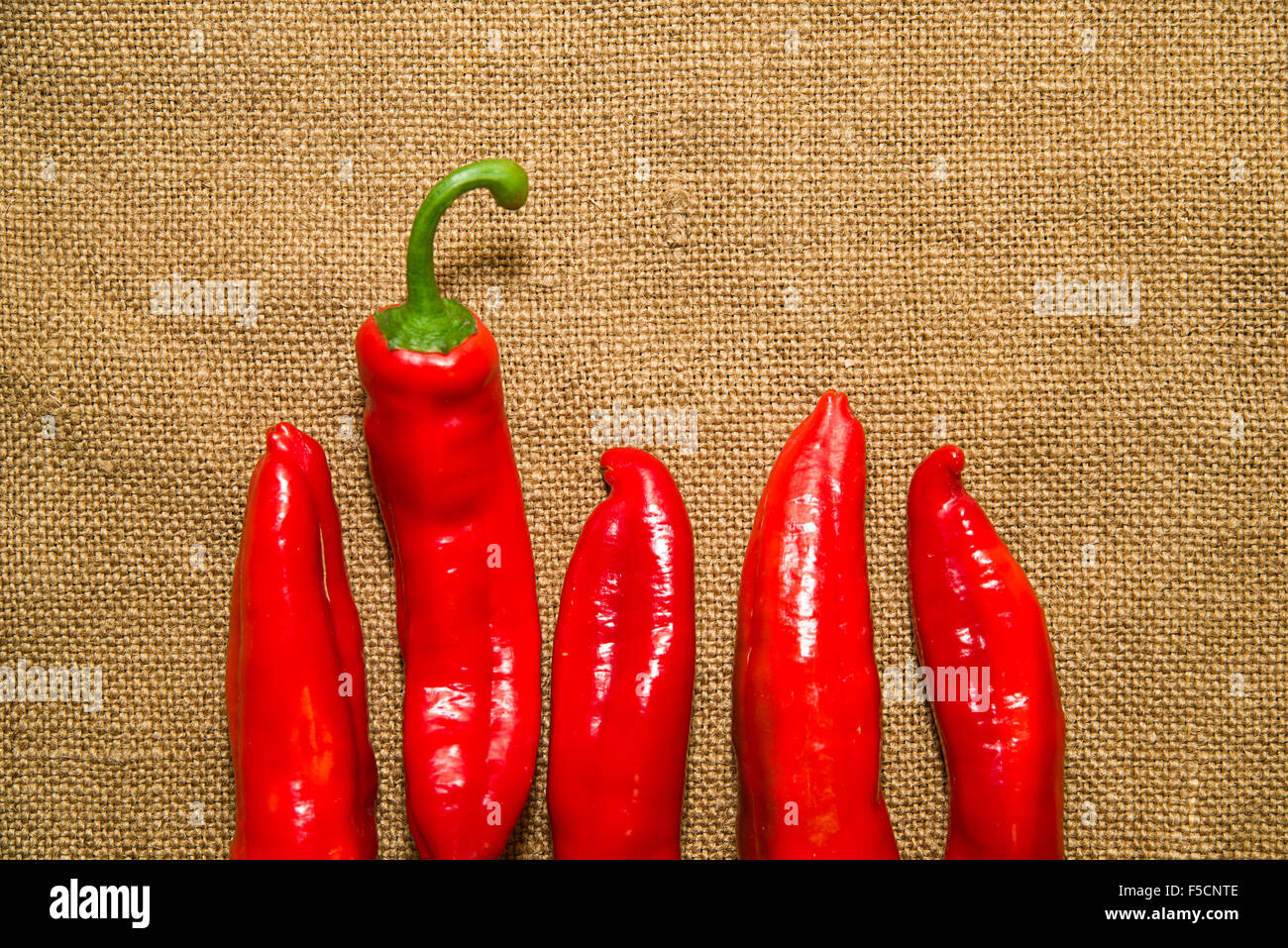 Many red peppers on the old cloth Stock Photo - Alamy