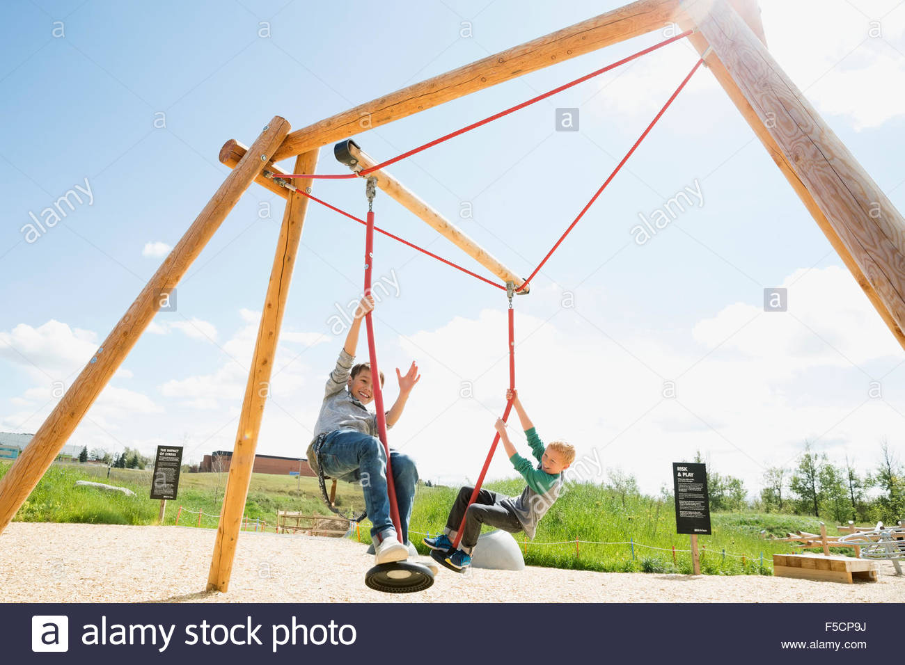 Two boys playing rope swing hires stock photography and images Alamy