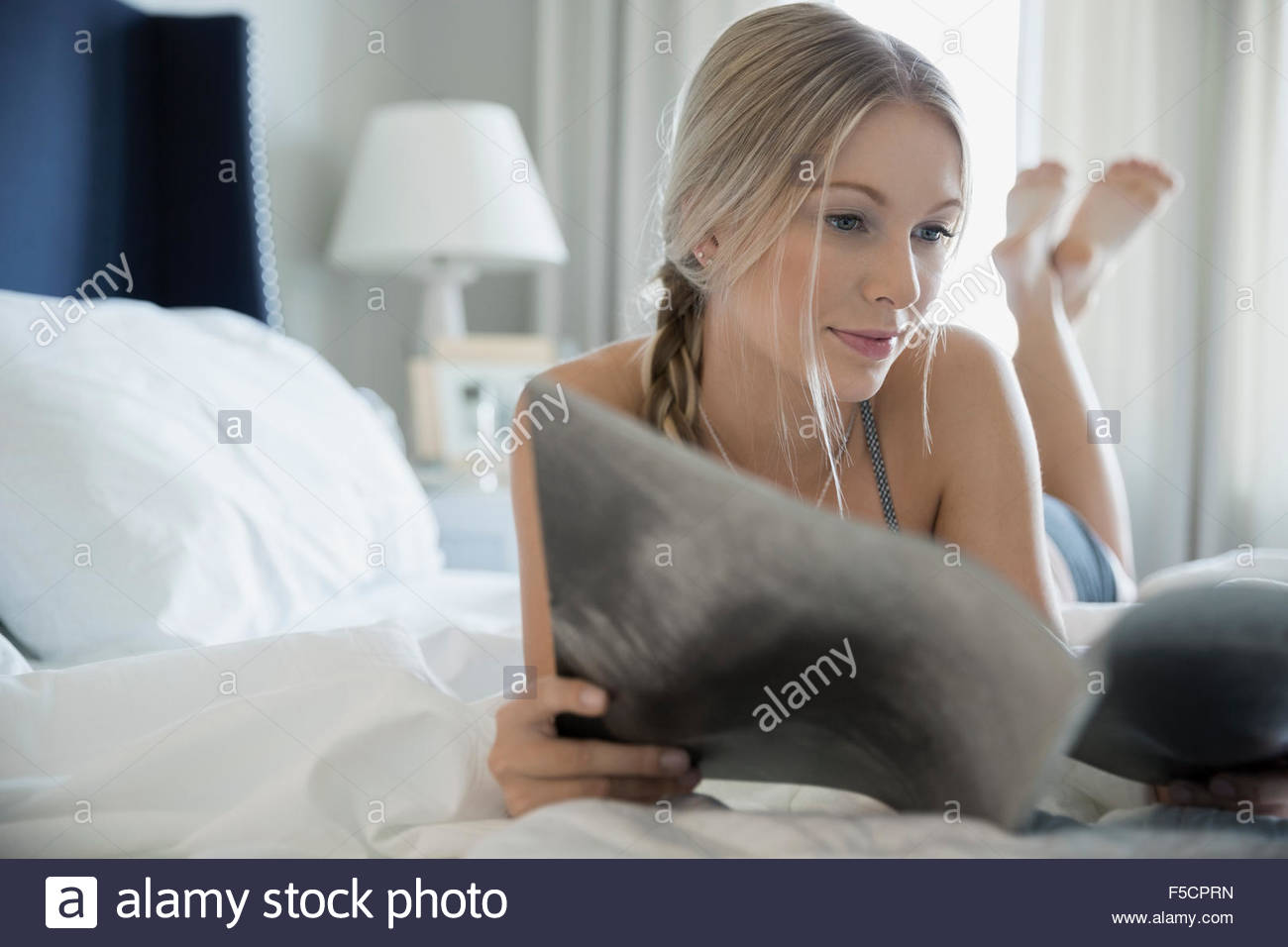 Reading woman laying hires stock photography and images Alamy