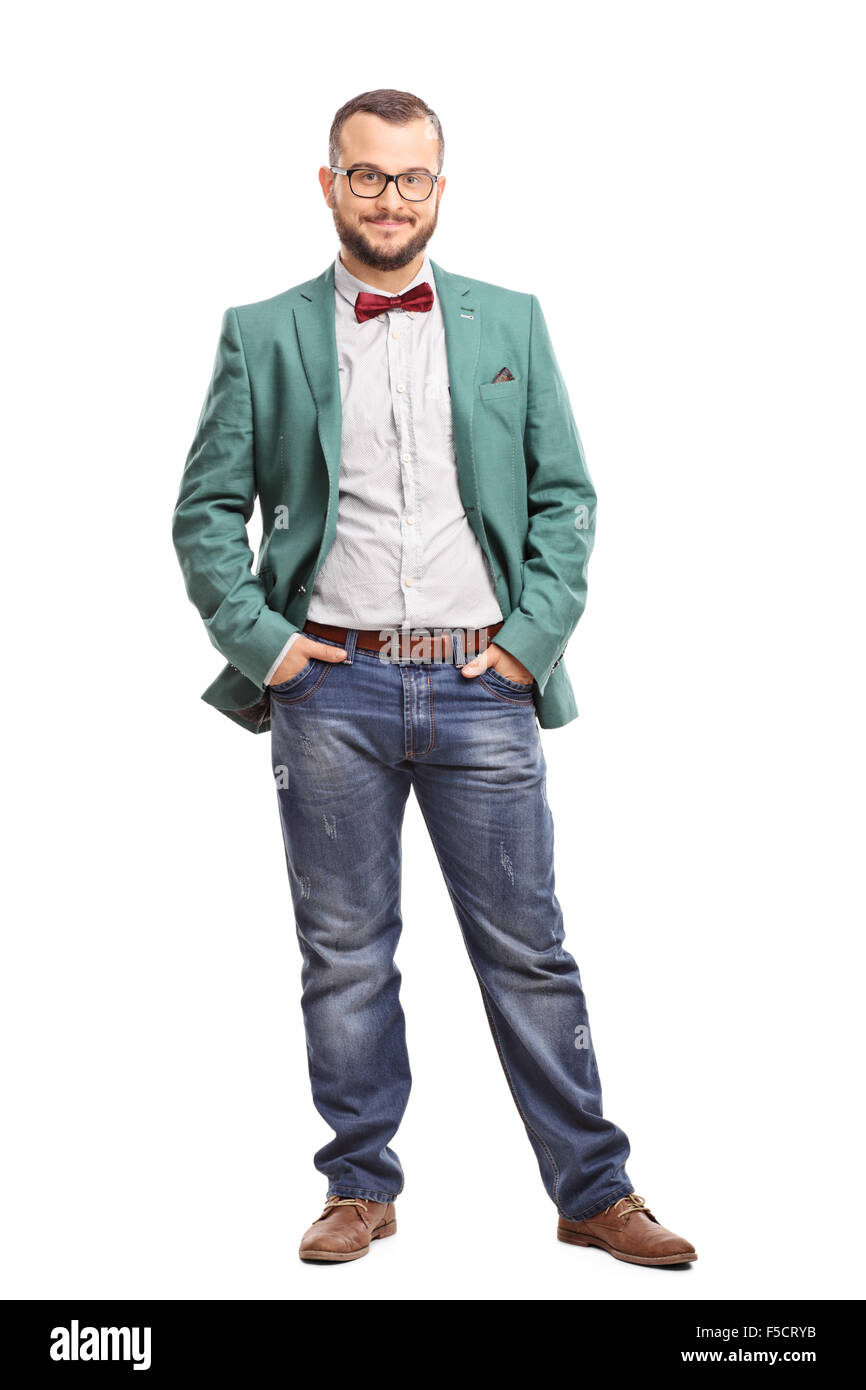Full length portrait of a young man posing in a green coat and a red bow-tie isolated on white background Stock Photo