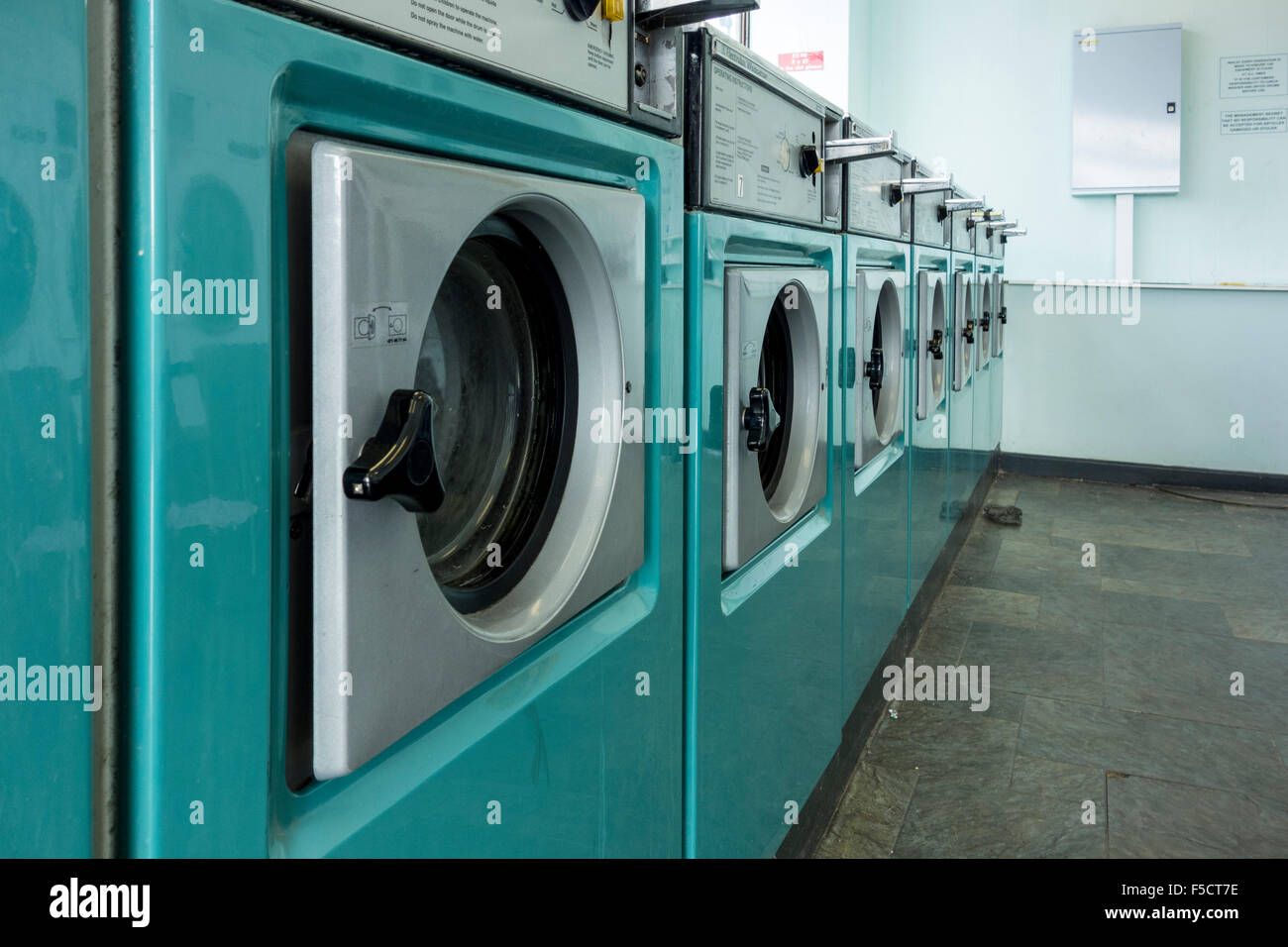 washing machines in a laundrette, UK Stock Photo