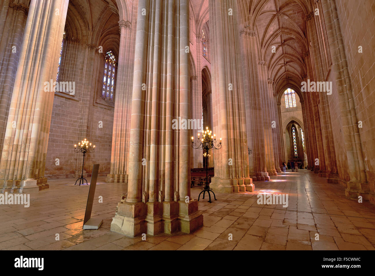 Portugal: Nave with gothic columns in the church Santa Maria da Vitoria in Batalha Monastery Stock Photo