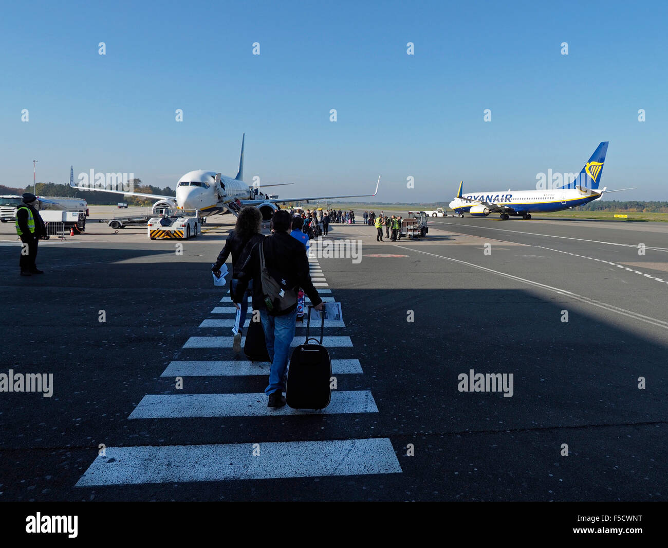 Passengers boarding Ryanair aeroplane on Weeze NRN airport Germany Stock Photo