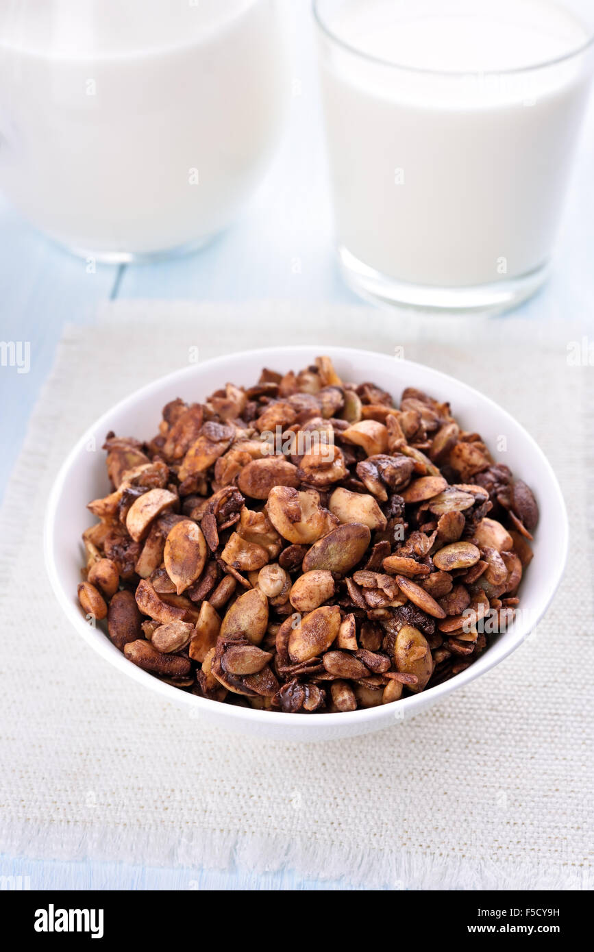 Breakfast chocolate granola with nuts, pumpkin seeds, sunflower seeds