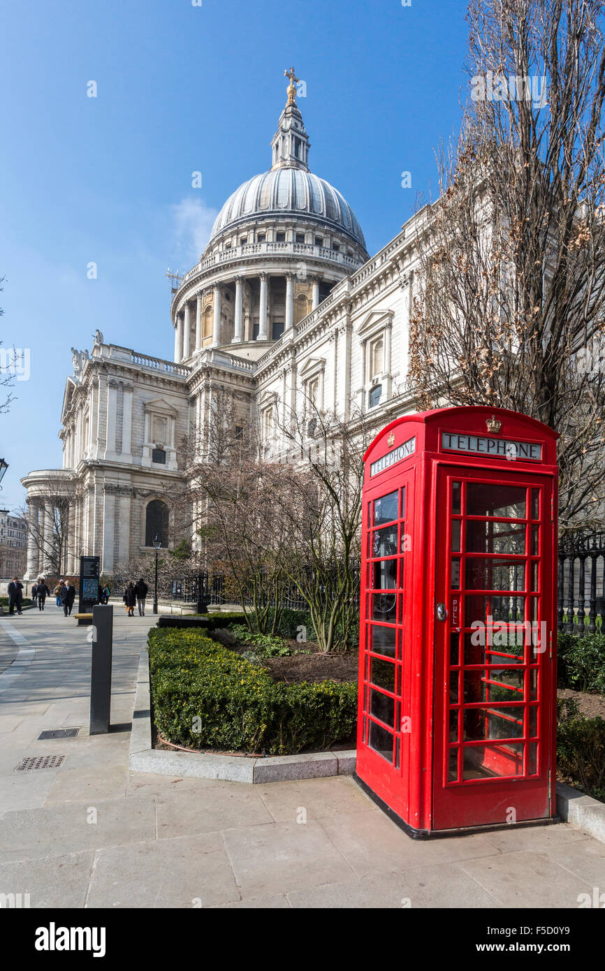 St Paul's Cathedral, London, with an iconic London telephone booth in the foreground. Stock Photo