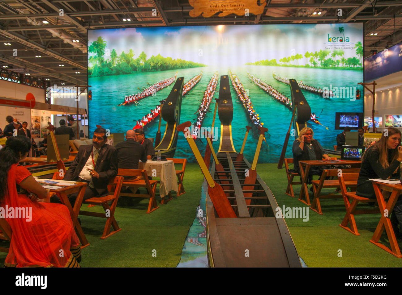 London, UK 2 November 2015. Exhibitors seen at eh Kerela Tourism stand at the World Travel Market 2015. Credit:  david mbiyu/Alamy Live News Stock Photo