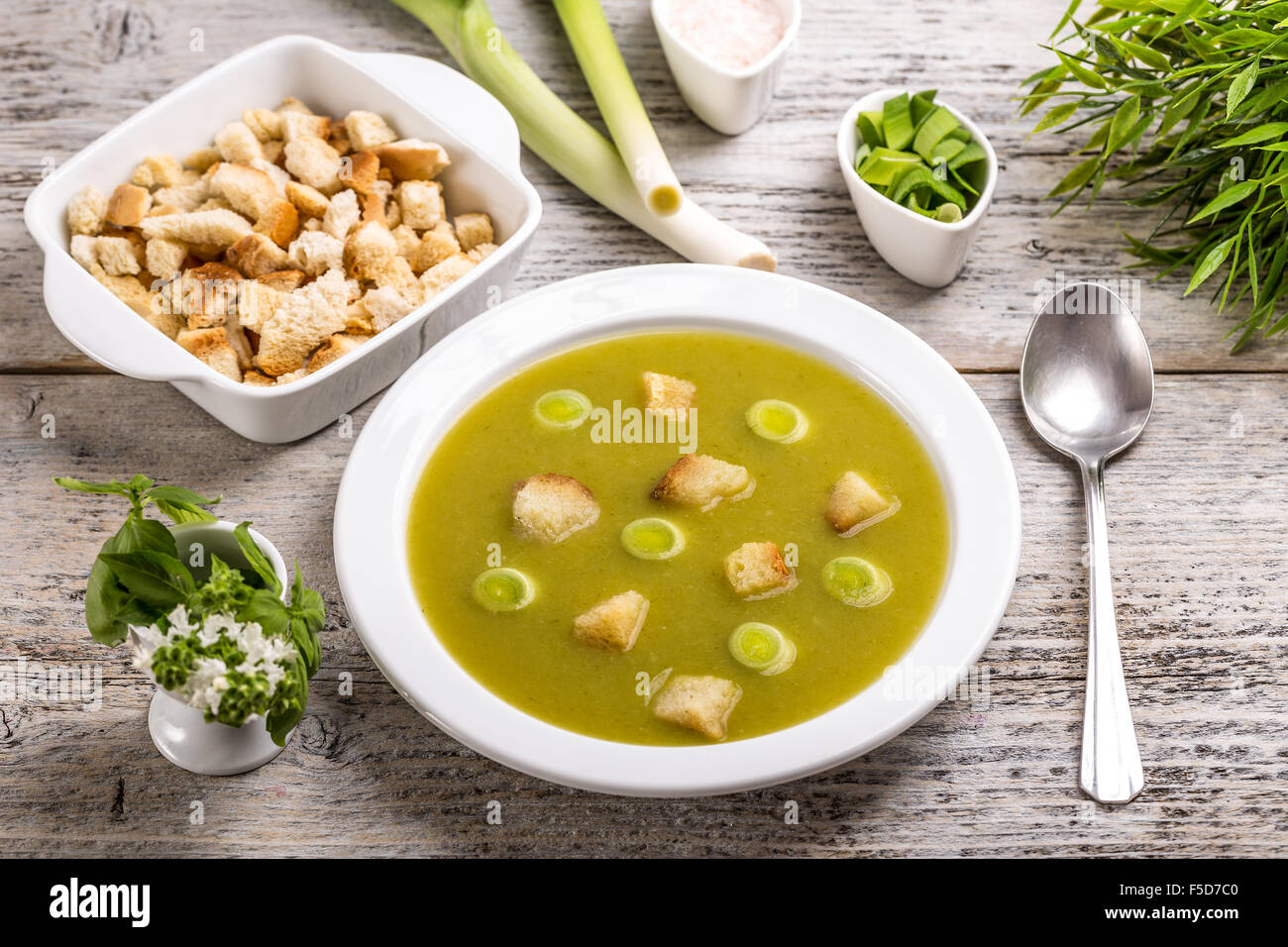 Leek and potato soup with a bread crouton garnish Stock Photo