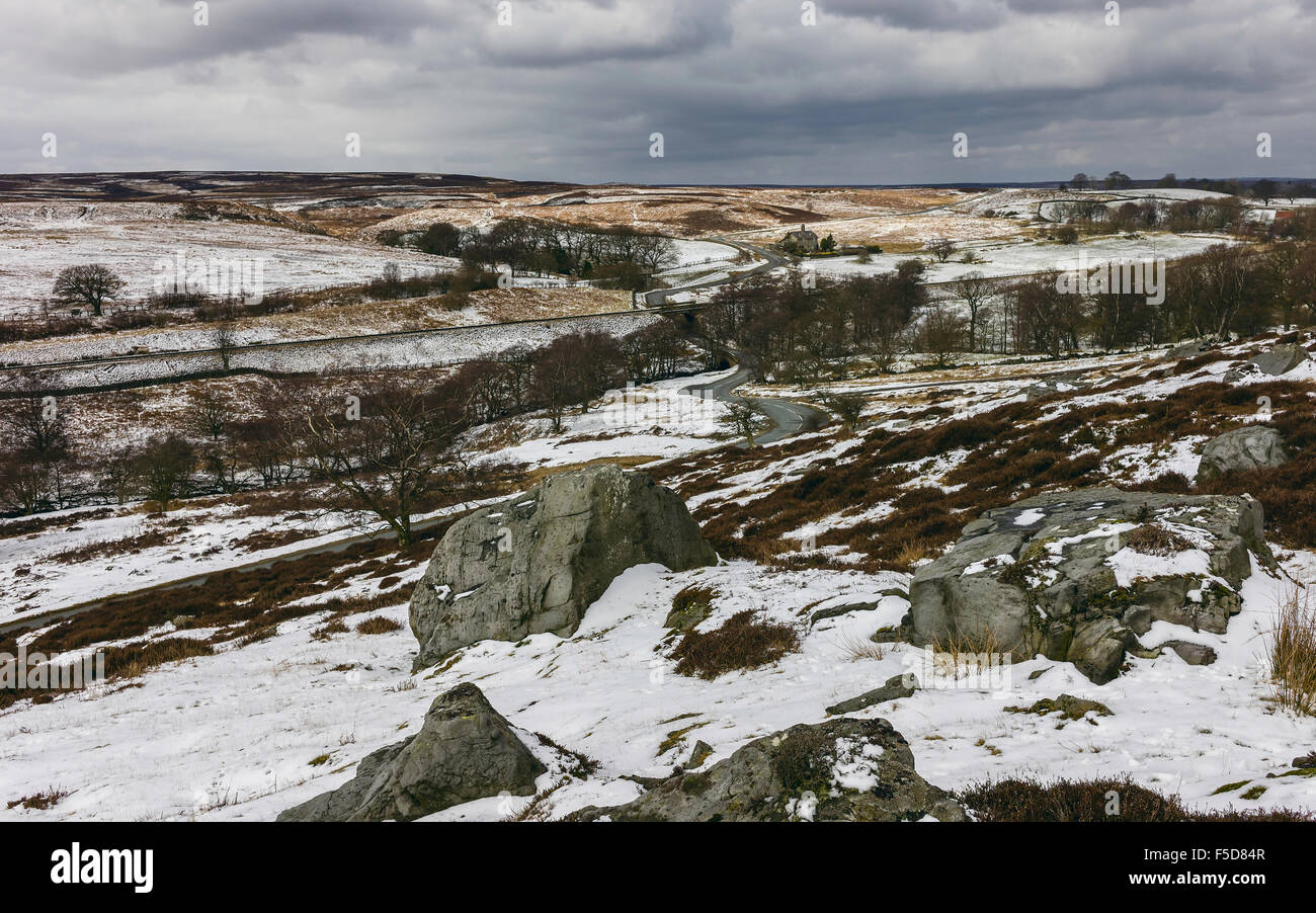 Snow over the North York Moors national park highlighting the rolling landscape near Goathland, Yorkshire, UK. Stock Photo