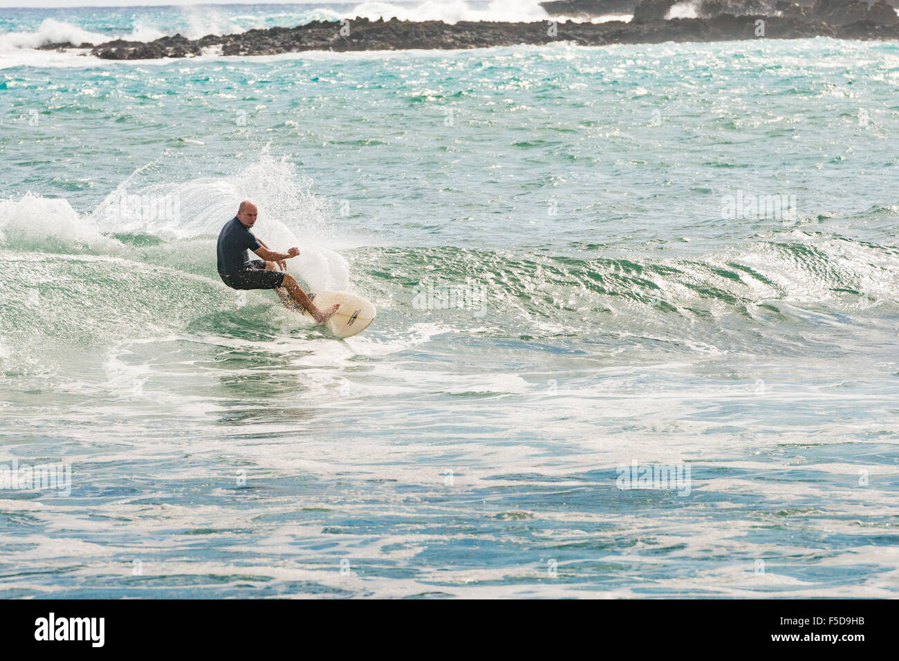 Surfer at La Perouse Bay, Maui, Hawaii Stock Photo