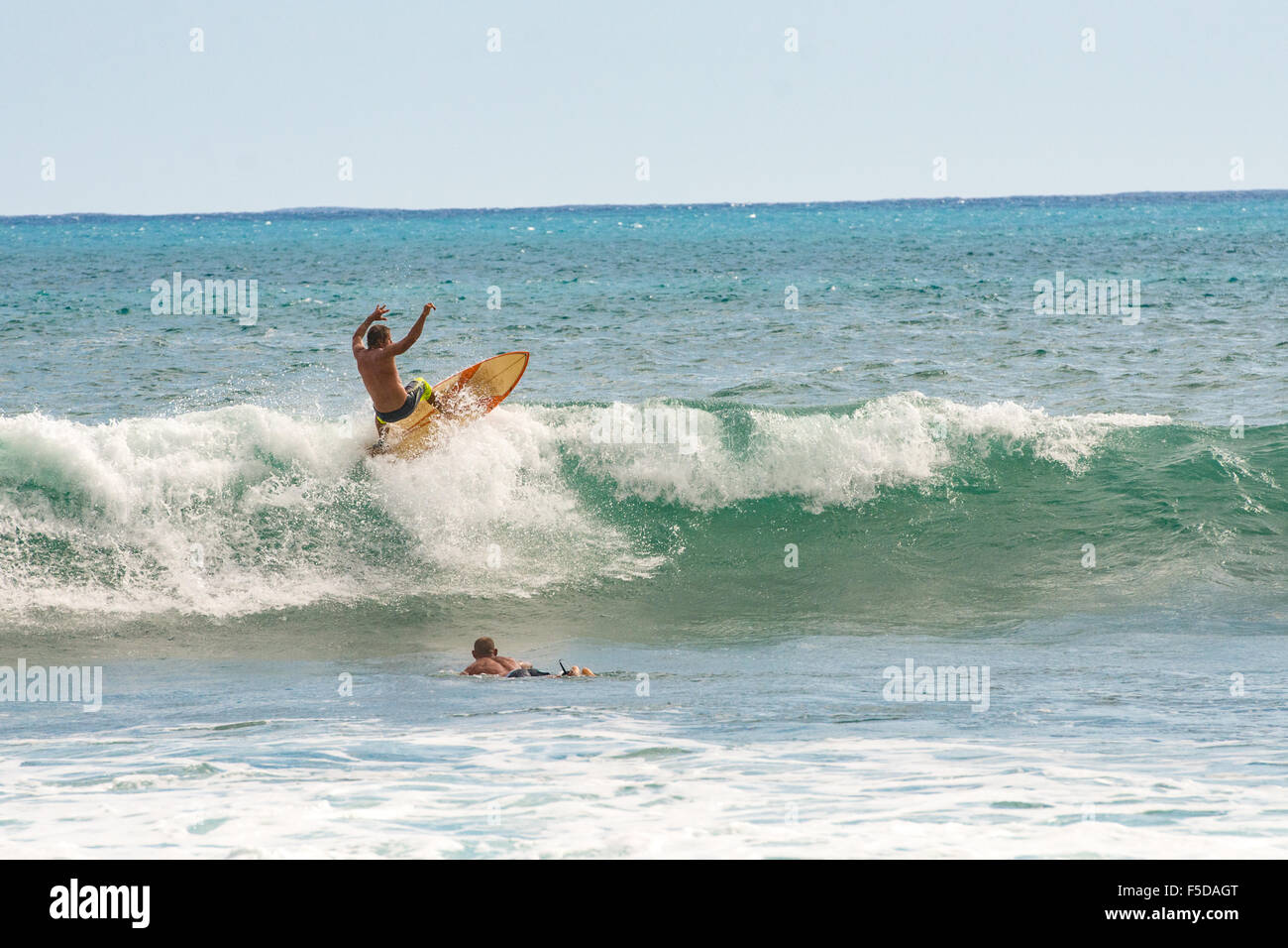 Surfers at La Perouse Bay, Maui, Hawaii Stock Photo