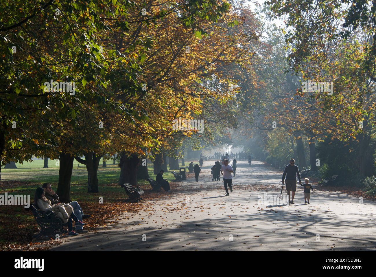 The Broadwalk on an autumn Sunday afternoon Regents Park London England Stock Photo