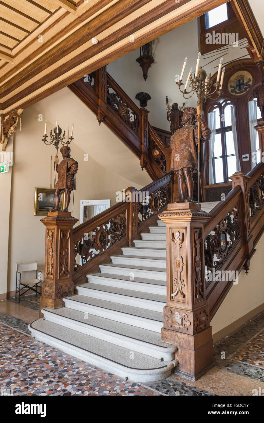 Miramare Trieste interior, view of the main oak staircase inside the Miramare castle, Trieste, Italy. Stock Photo