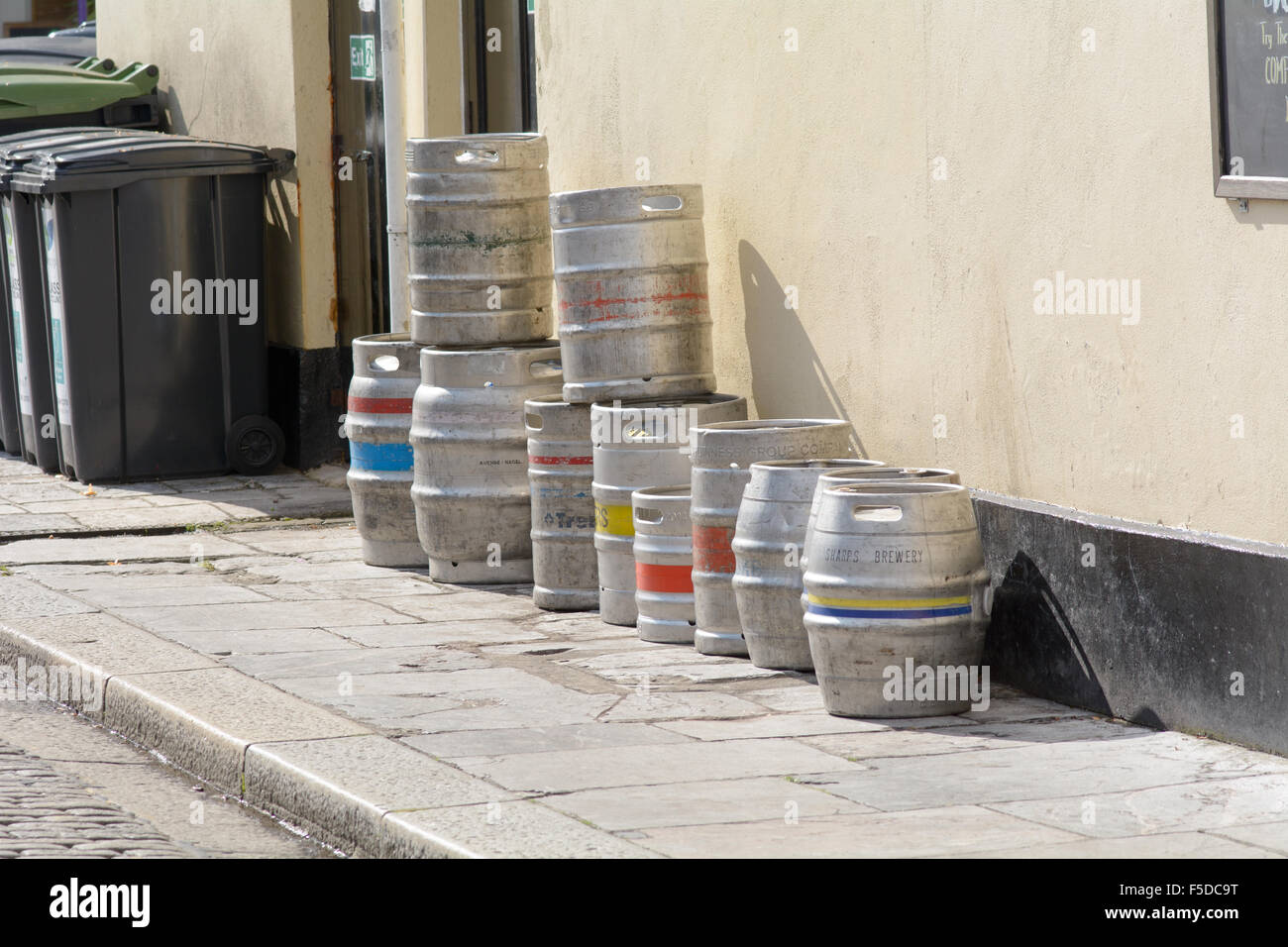 Line of beer barrels outside pub in Plymouth, Devon, England Stock