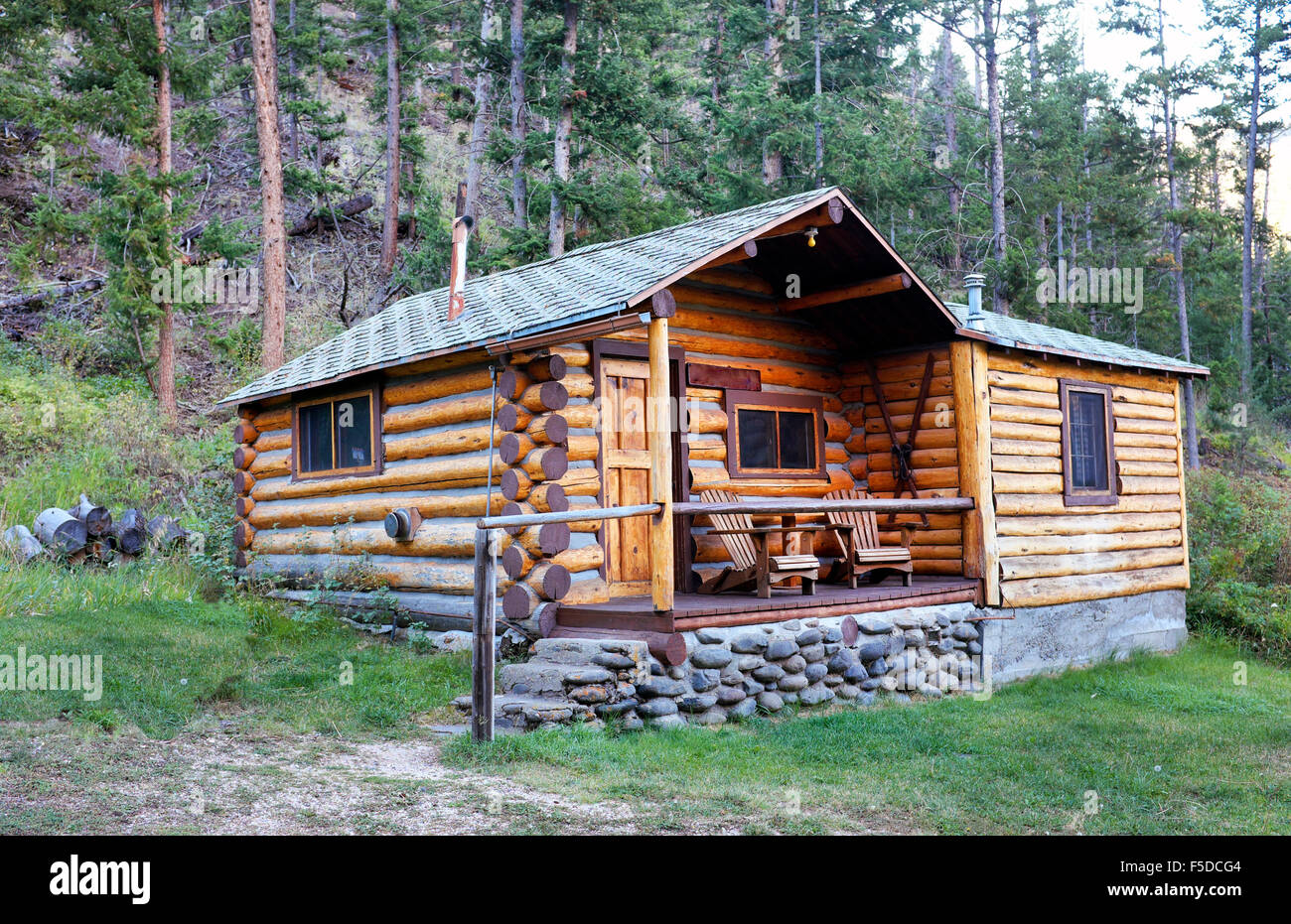 A small log cabin in a remote part of the Absaroka Mountains in Wyoming east of yellowstone National park. Stock Photo