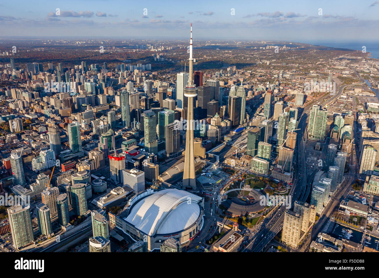 High Level shot of Toronto Downtown with the CN Tower and Rogers Centre Skydome in the foreground. Stock Photo