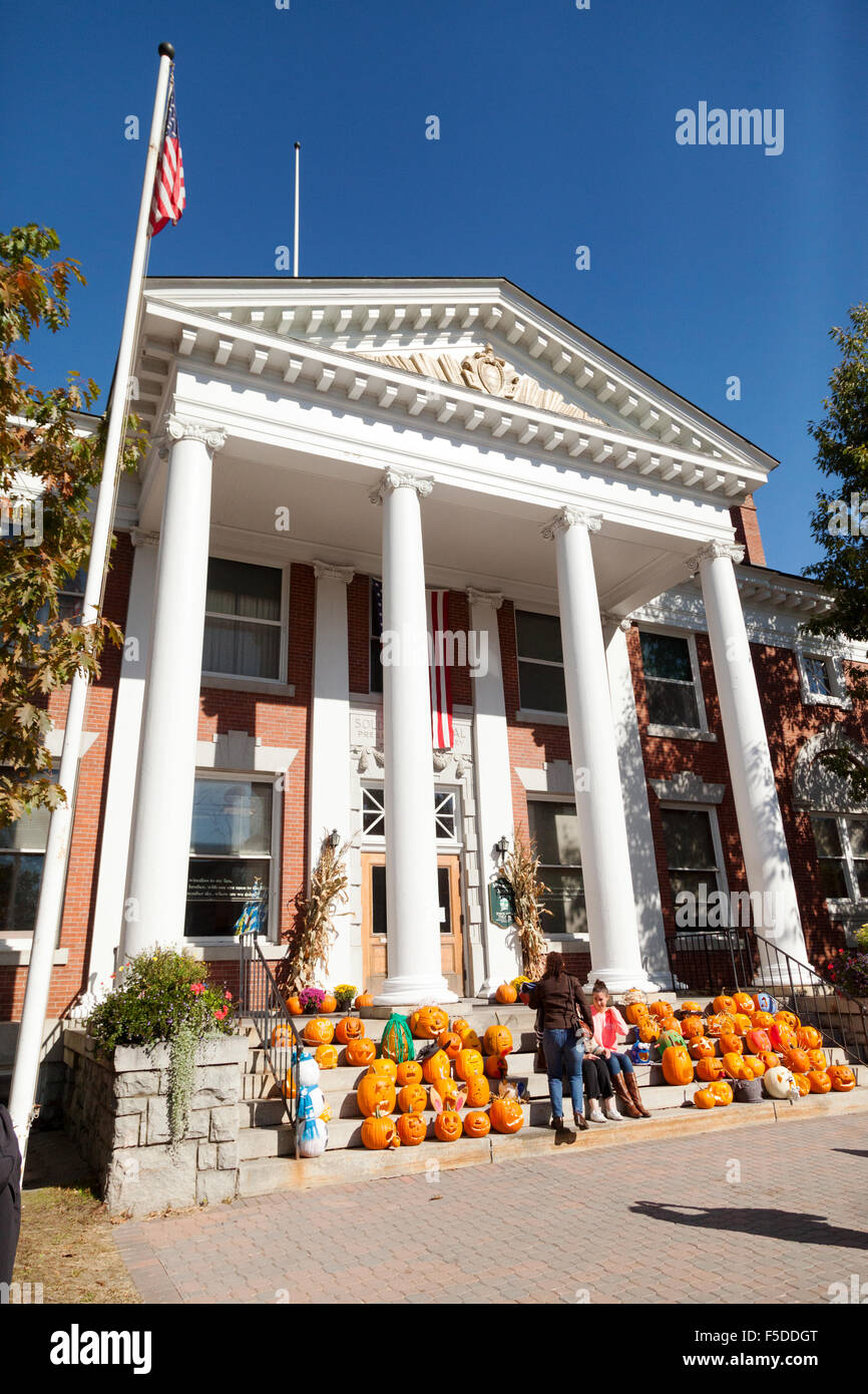 Pumpkins on the steps at halloween, the Town Hall, Stowe, Vermont VT USA Stock Photo