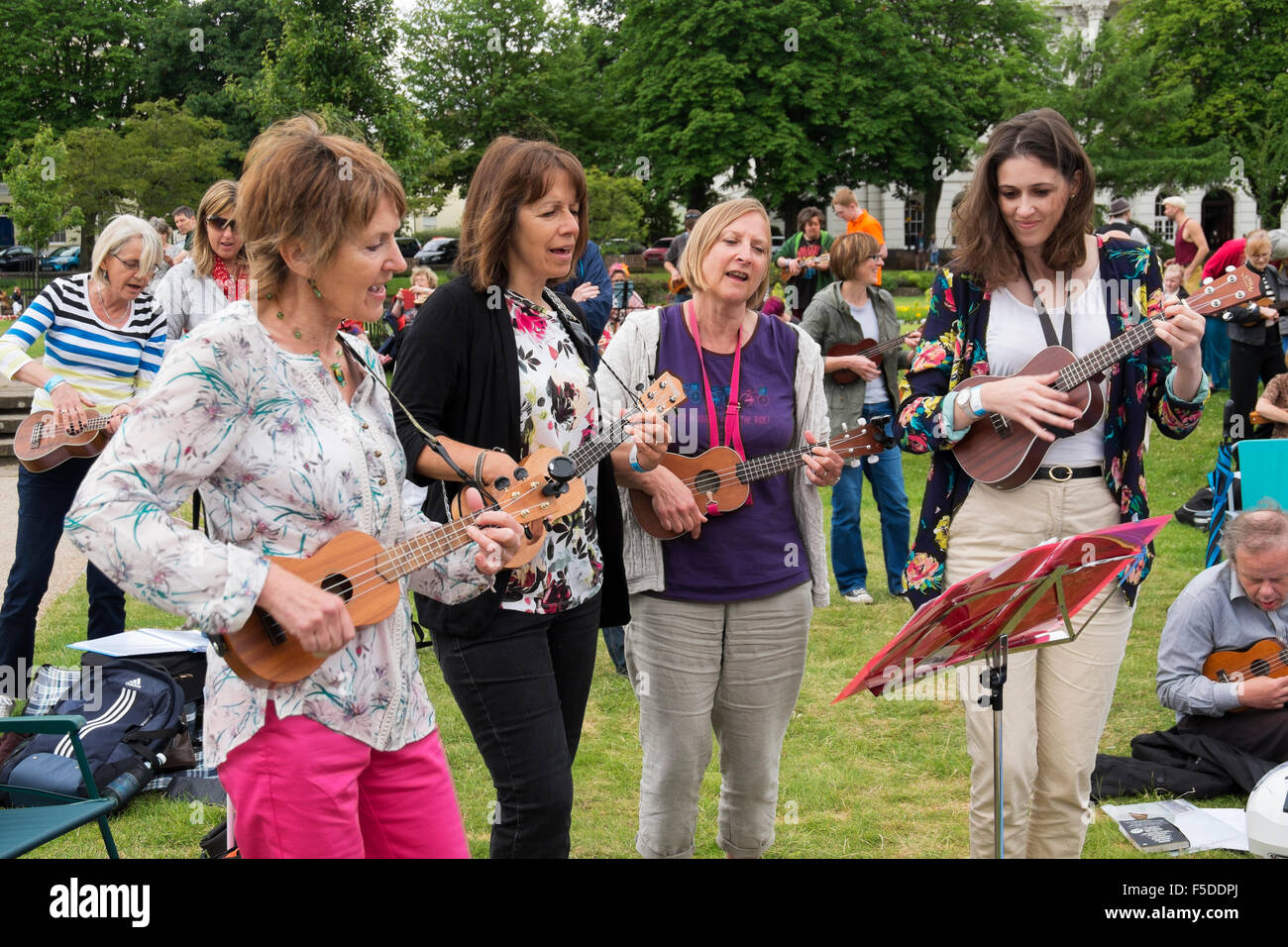 A group of women playing ukuleles at the Big Busk, part of the Ukulele