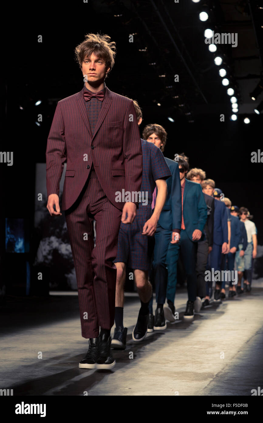 Male models walking towards the camera at London fashion week or LCM Stock  Photo - Alamy