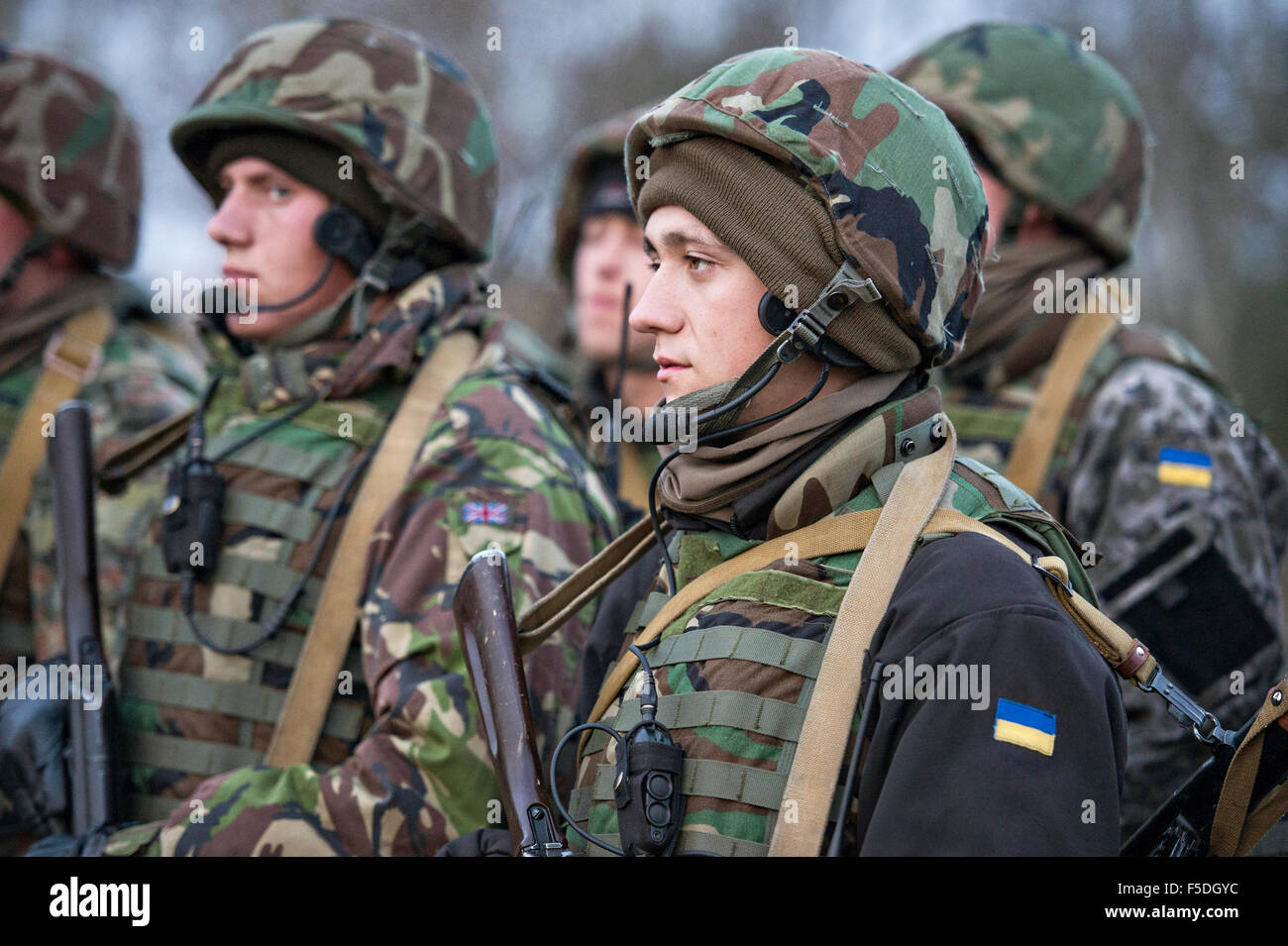 Ukrainian Army Ground Forces soldiers following a live-fire training exercise at Central City Camp, International Peacekeeping and Security Center October 29, 2015 near Yavoriv, Ukraine. Stock Photo
