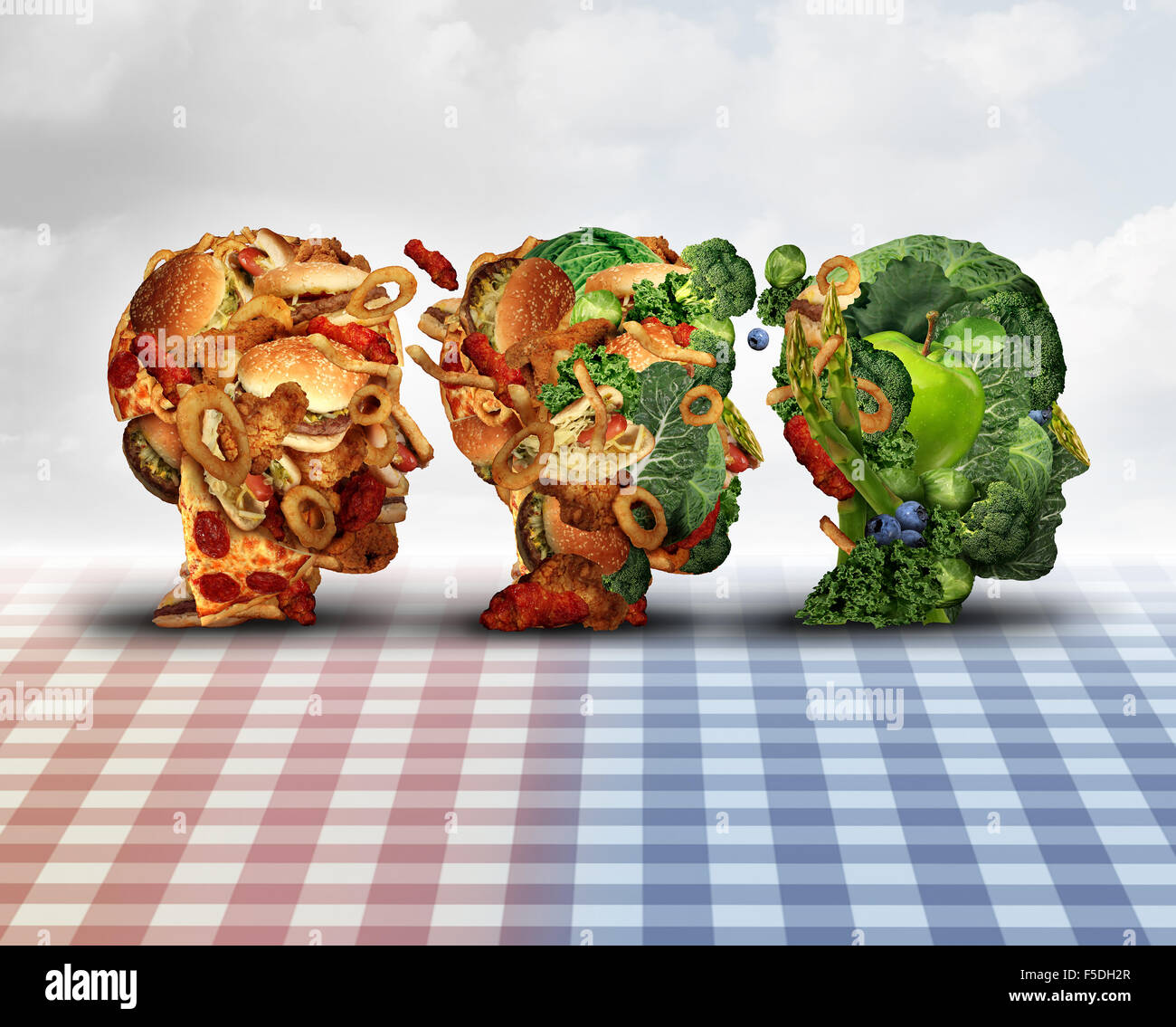 Changing diet healthy lifestyle achievement concept dieting progress change as a healthy lifestyle improvement symbol and evolving from unhealthy junk food to fresh fruits and vegetables shaped as a human head. Stock Photo