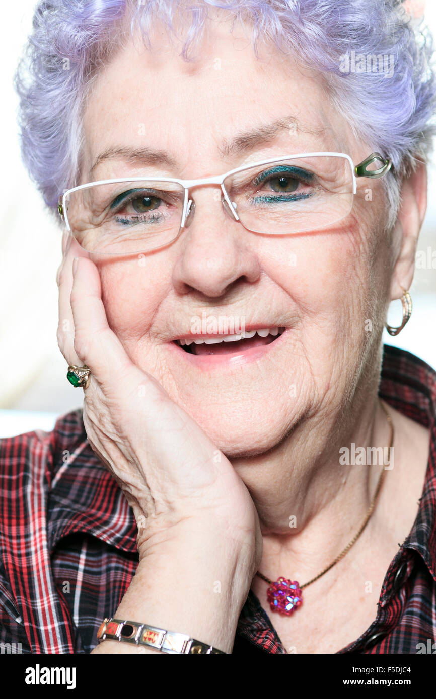 Portrait of a happy senior woman at home Stock Photo