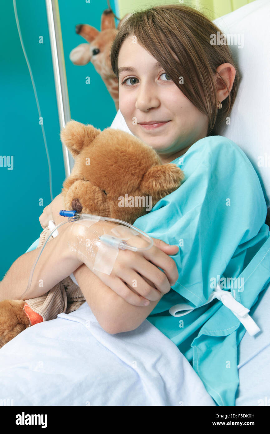 Little girl in hospital bed with the nurse Stock Photo Alamy