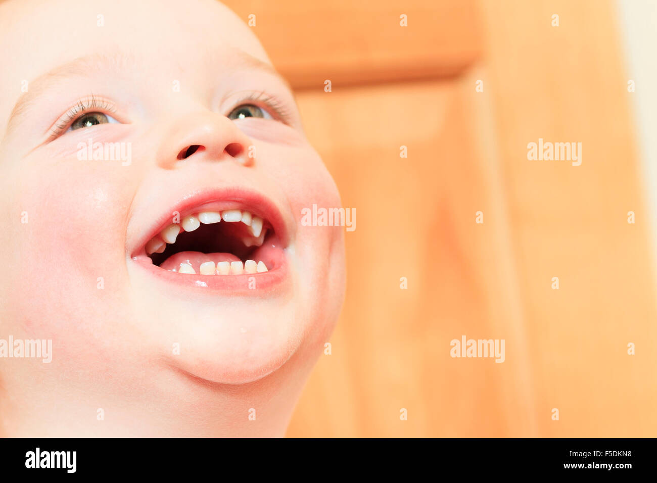 Happy 2 years old baby boy. Kid is smiling, grinning. Stock Photo