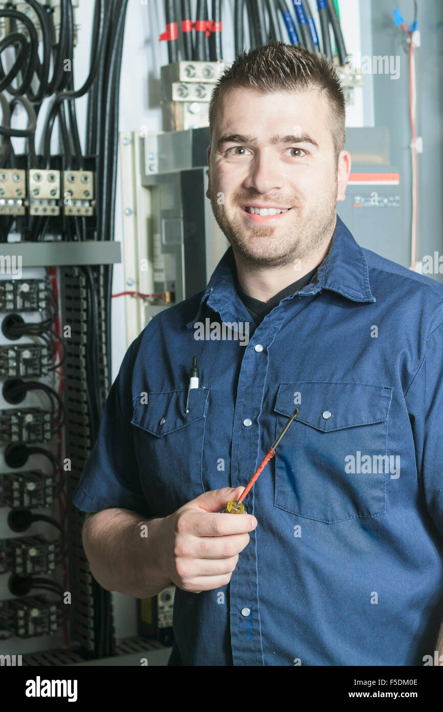 Portrait of an electrician in a room Stock Photo Alamy