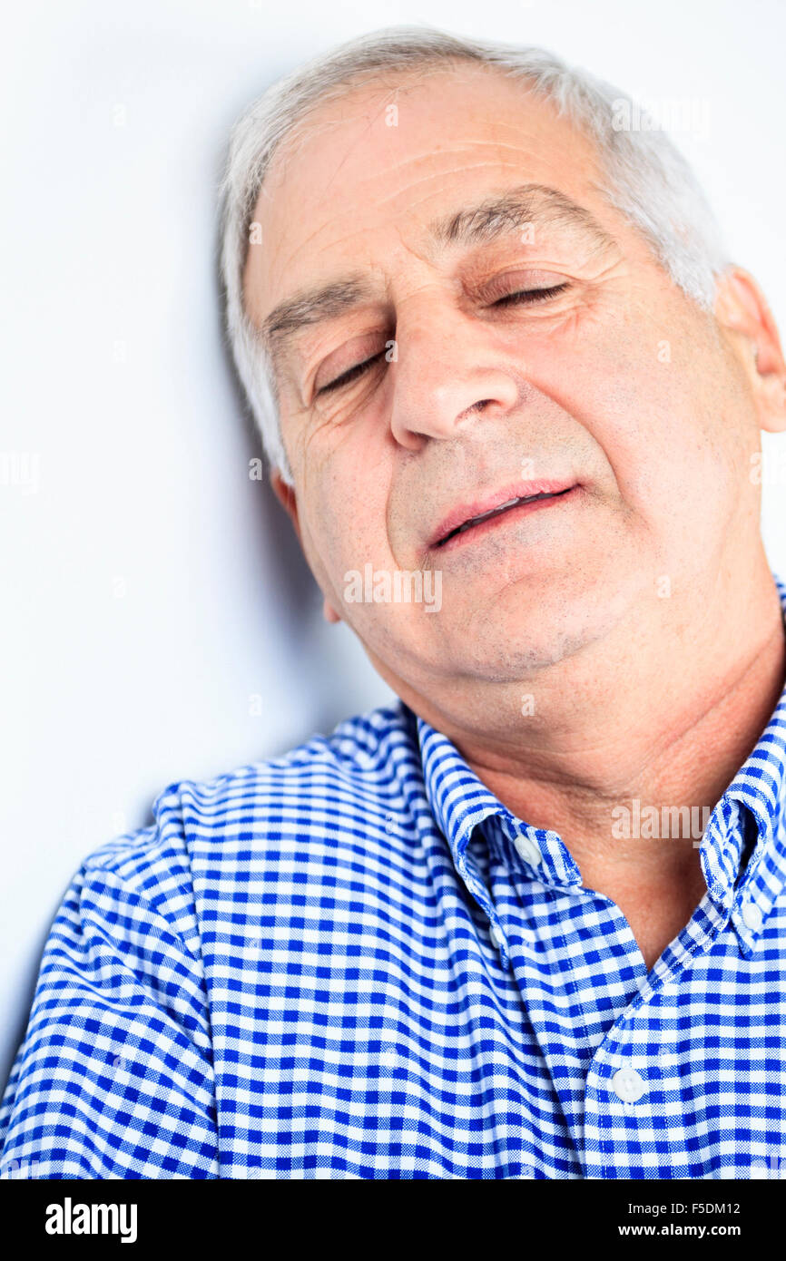 old senior portrait in gray background Stock Photo Alamy