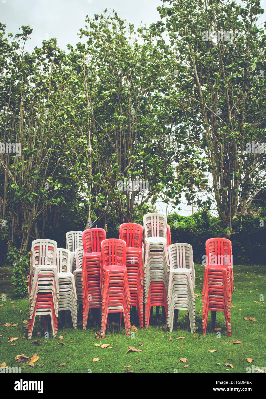 Large stack of plastic chairs in Indonesia Stock Photo Alamy