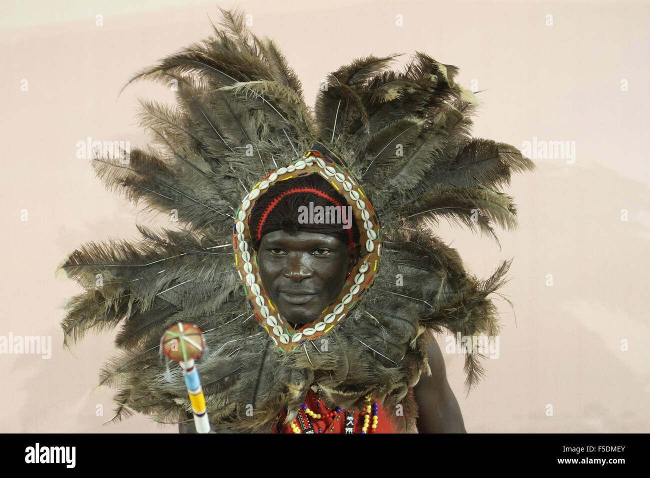 London, UK. 2nd Nov,  2015. Exhibitor dressed in Massai cultural custume from the Bomas of Kenya in cultural custom pose for photos at the Magical Kenya stand at the World Travel Market 2015. Credit:  david mbiyu/Alamy Live News Stock Photo
