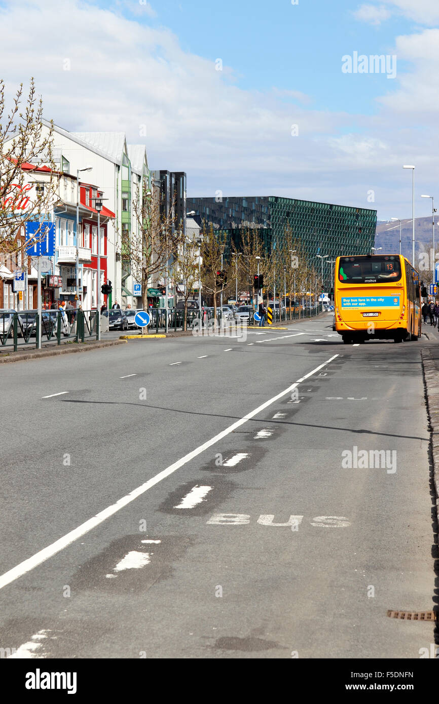 Street scene with bus and Harpa Concert Hall and Conference Centre Reykjavik Iceland Stock Photo