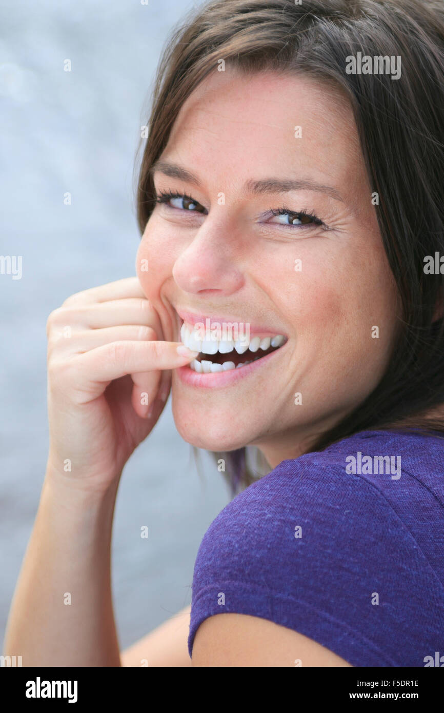 A Beautiful girl portrait outdoor on the water border Stock Photo - Alamy