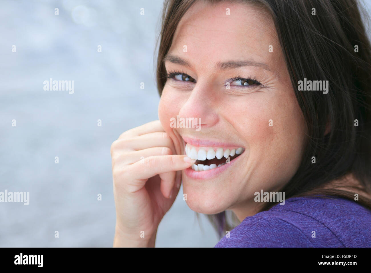 A Beautiful girl portrait outdoor on the water border Stock Photo - Alamy