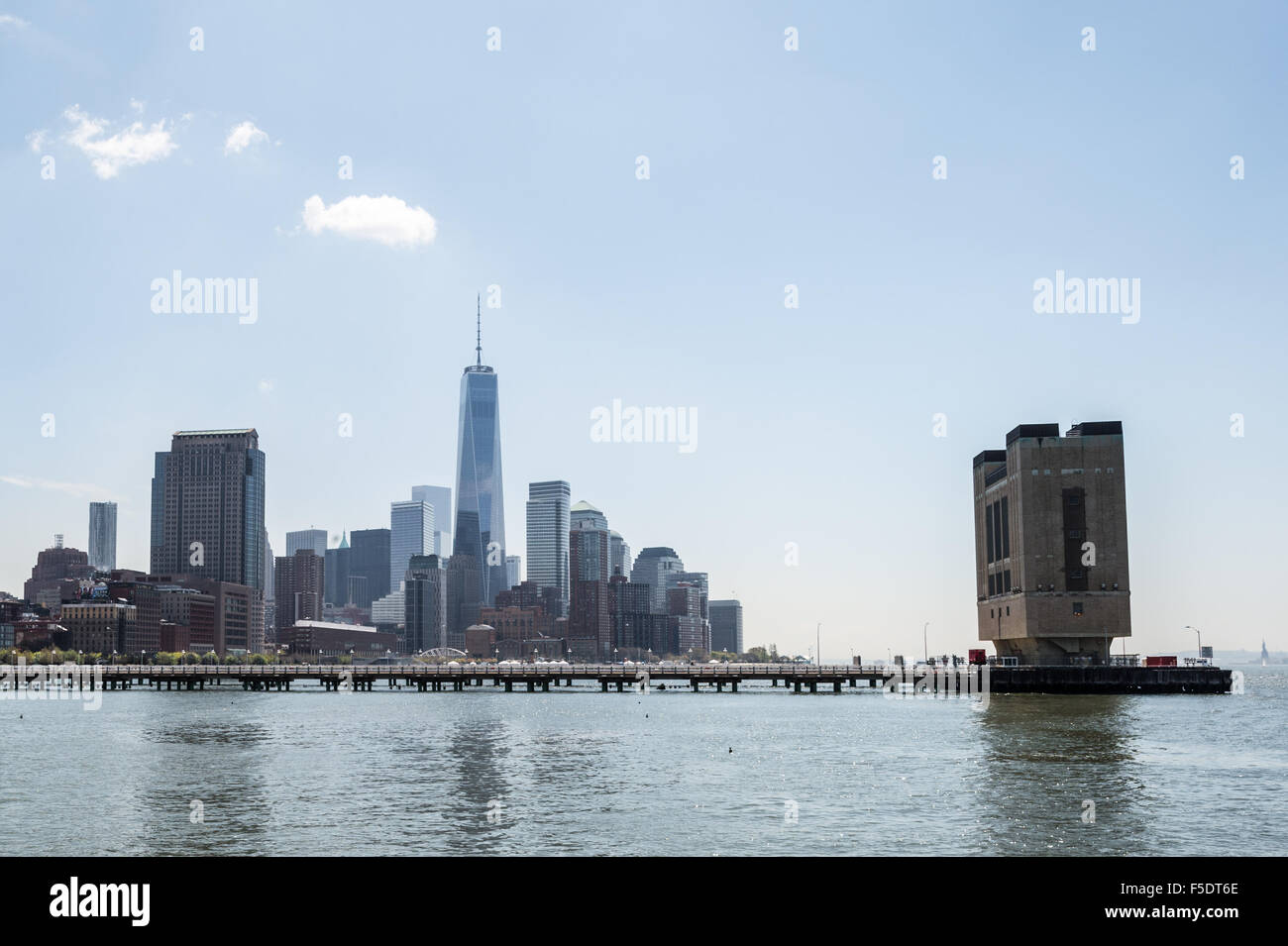 Holland Tunnel air ventilation tower with lower Manhattan in background. Stock Photo