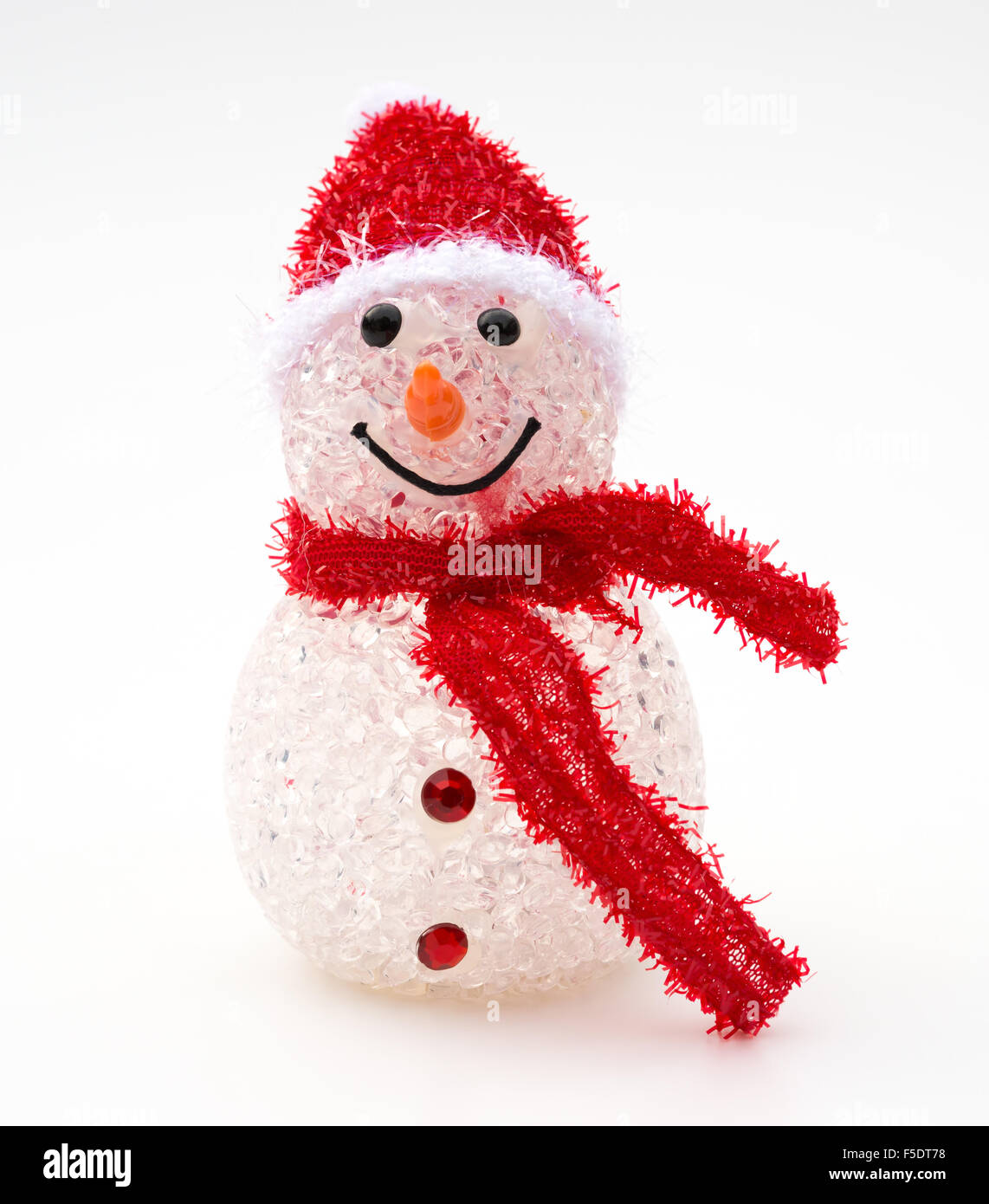 smiling toy christmas snowman with red scarf Stock Photo