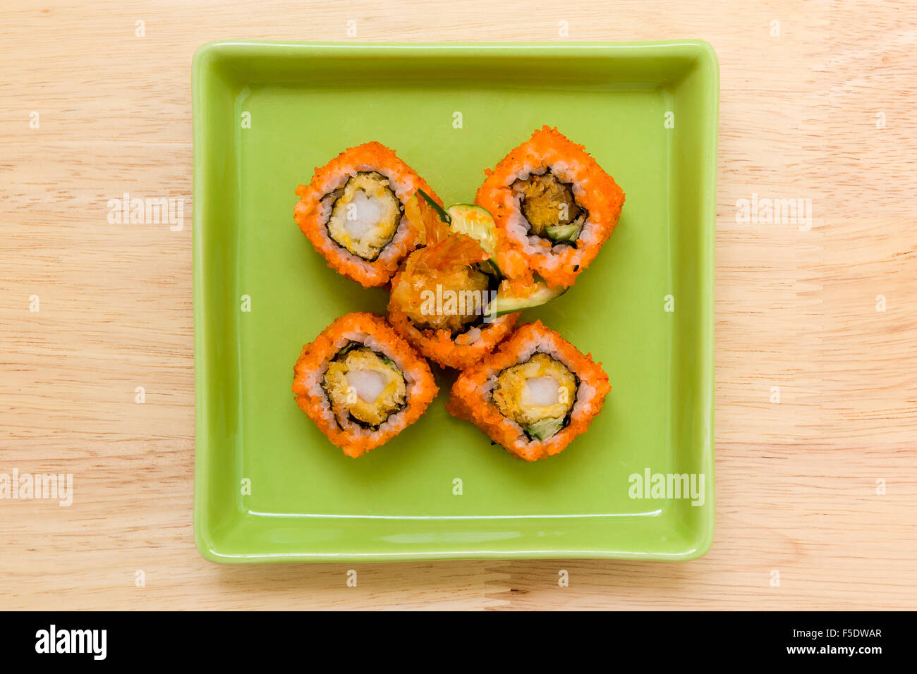 Traditional Japanese food, sushi roll, on wooden background Stock Photo