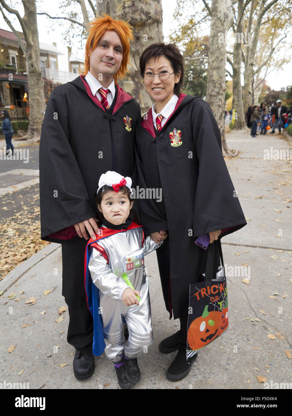 Family trick-or-treating n the Kensington section of Brooklyn, New York,  2015. Parents dressed as characters from Harry Potter Stock Photo - Alamy