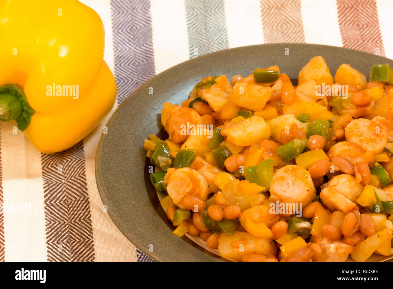Chicken sausages with potato casserole Stock Photo Alamy