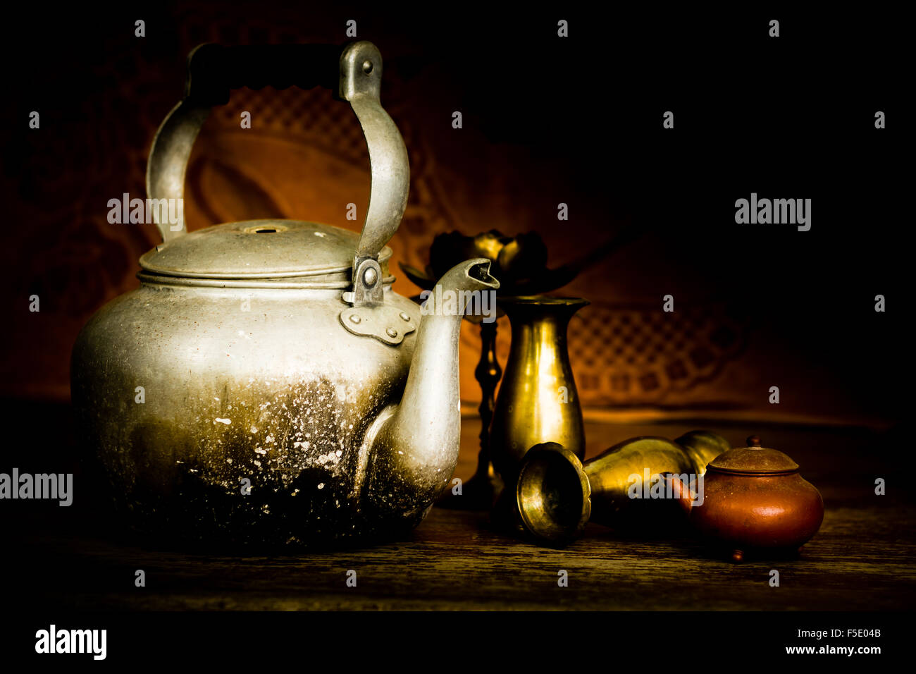 Still life with Candlesticks, vases and teapots Stock Photo