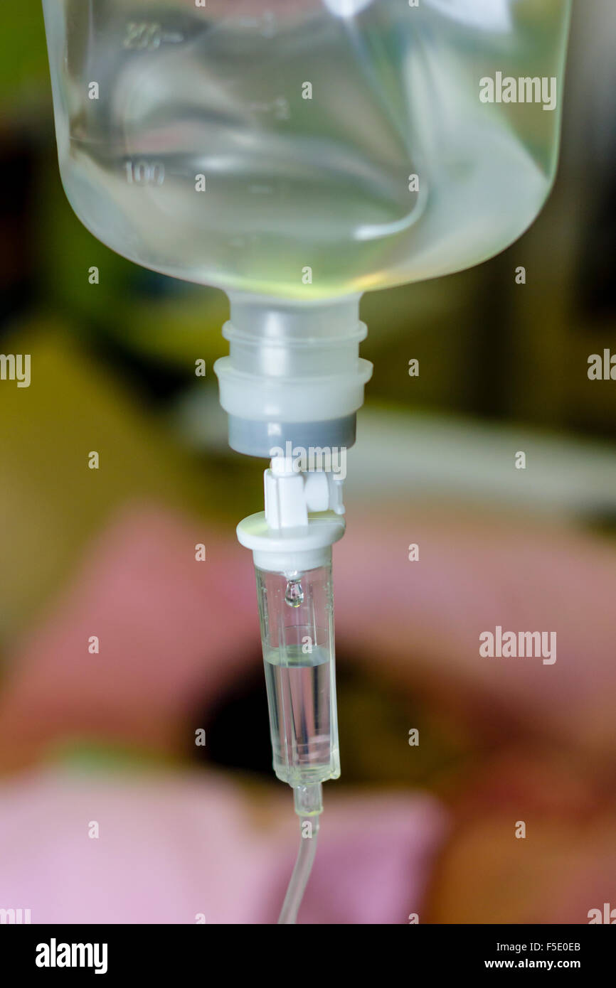 Close up saline drip for patient and Infusion pump in hospital Stock