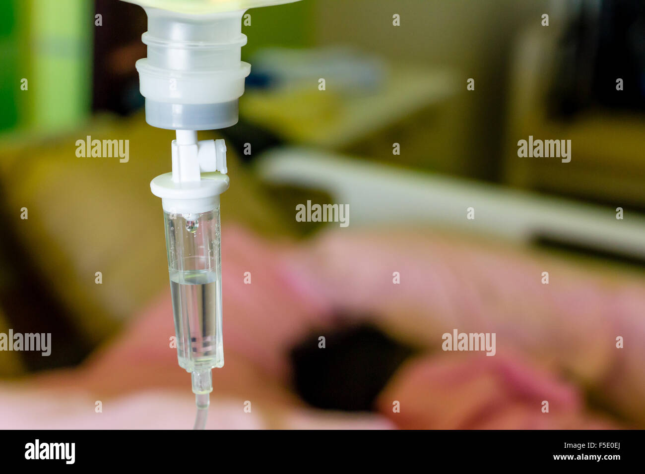 Close up saline drip for patient and Infusion pump in hospital Stock