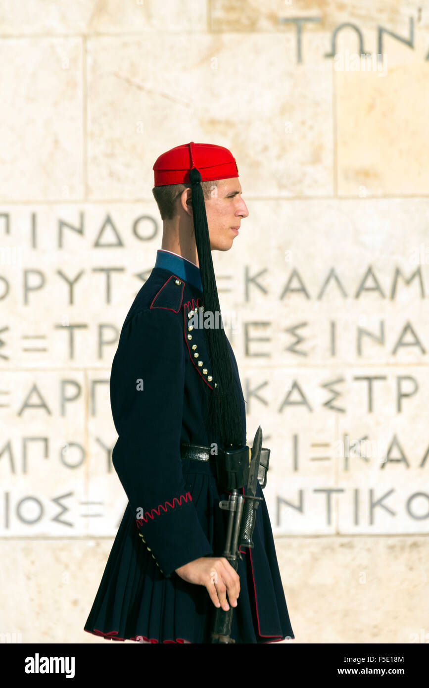 ATHENS, GREECE – OCTOBER 26, 2015: Evzone (presidential guard) at the monument of Unknown Soldier in front of the Greek Parliame Stock Photo