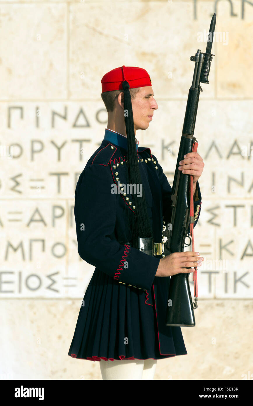 ATHENS, GREECE – OCTOBER 26, 2015: Evzone (presidential guard) at the monument of Unknown Soldier in front of the Greek Parliame Stock Photo