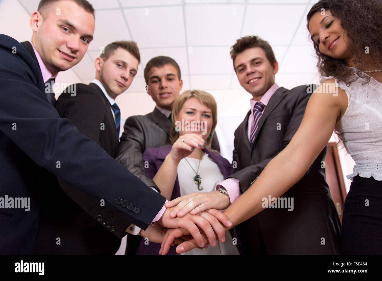 Friendly harmonious business team Stock Photo