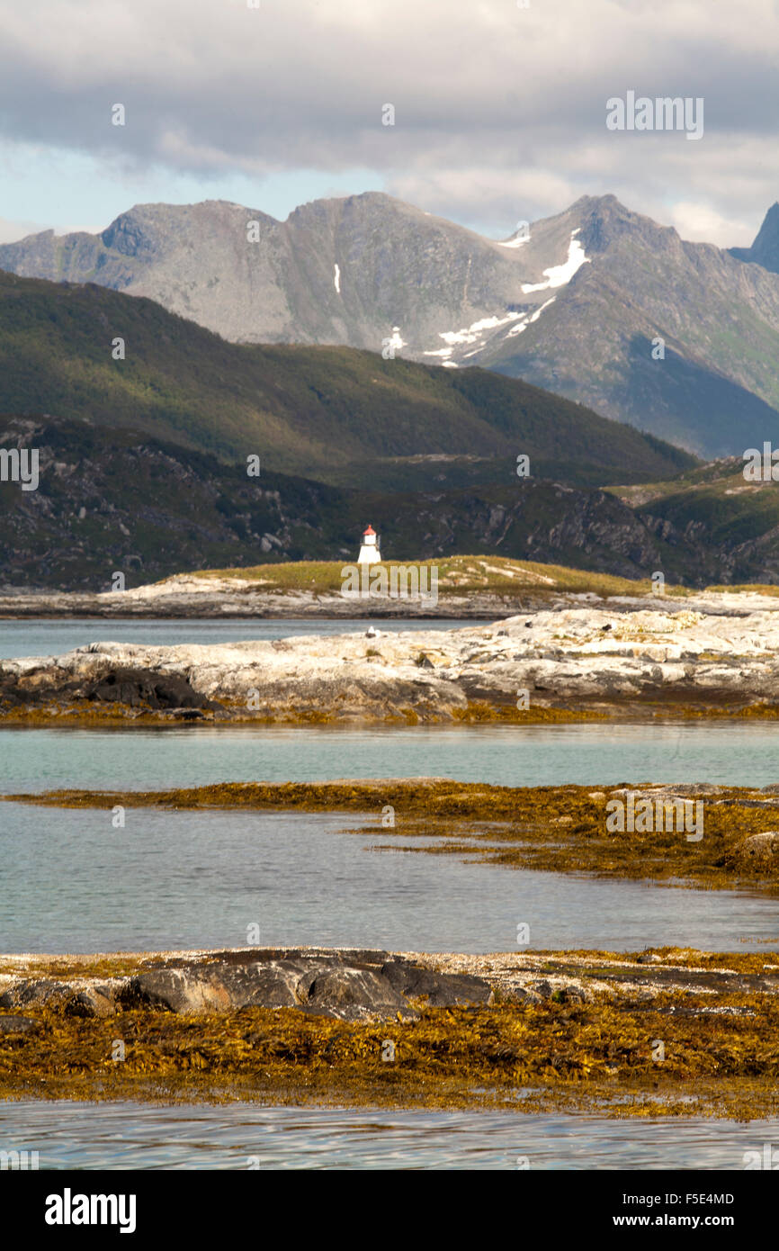 Low tide at Sommarøy a small island in the Tromso area, Norway, high peaks are in the distance. Stock Photo