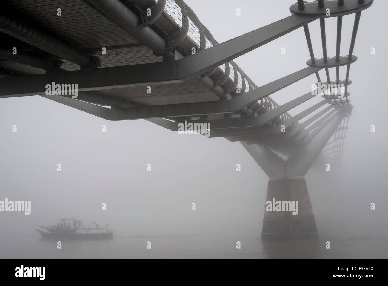 Thick Fog over The Millennium Bridge and River Thames this morning. Stock Photo