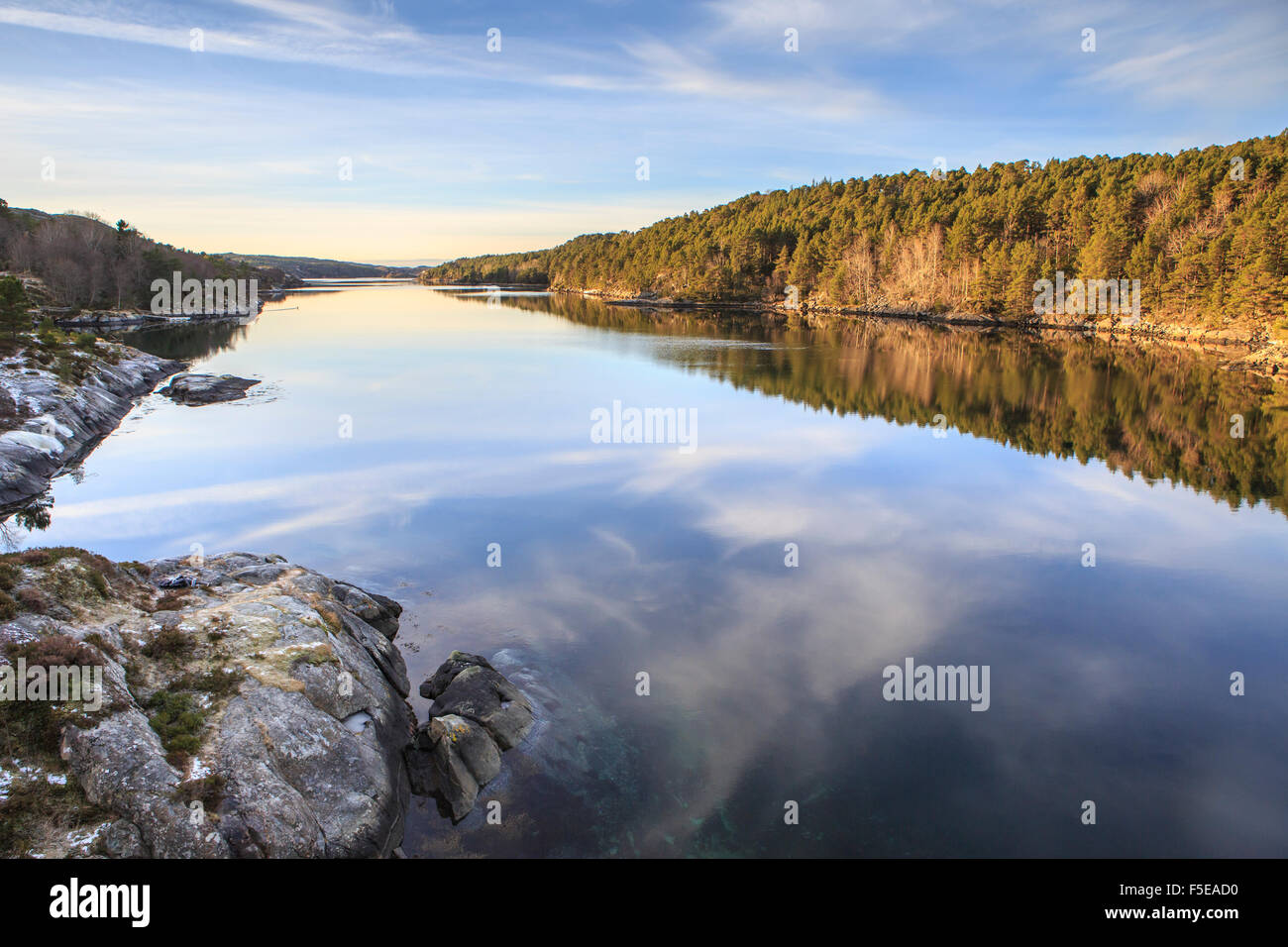 Woods reflected in the calm waters, Hitra Island, Trondelag, Norway, Scandinavia, Europe Stock Photo