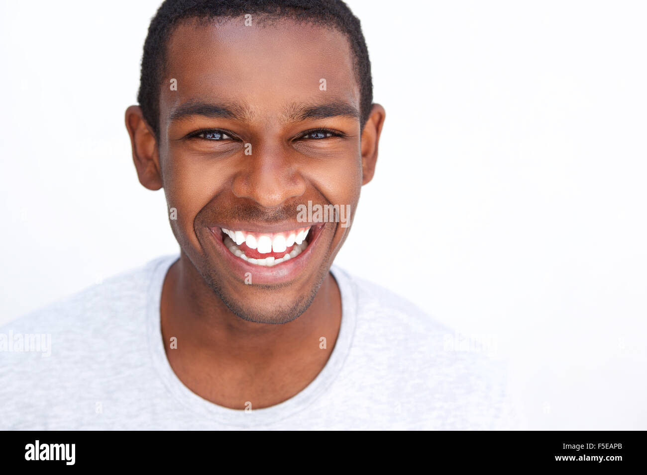 Close up portrait of a smiling teenage african american guy Stock Photo
